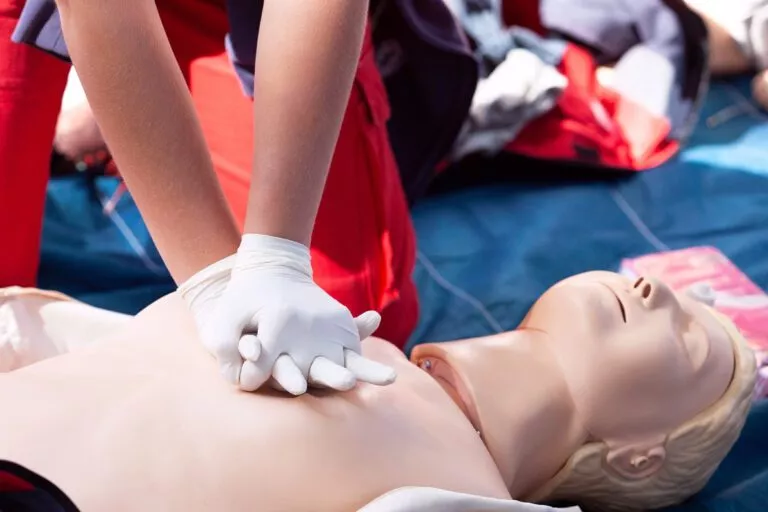 CPR - Cardiopulmonary resuscitation and first aid class. Health care concept